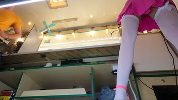 Beautiful 18-year-old damsel at work, hidden camera captures her upskirt shots.