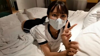 Xnxx video of a pretty Chinese girl with beautiful legs in milky stockings.