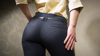 Asian beauty in tight office pants showcases off her great ass and panty line.