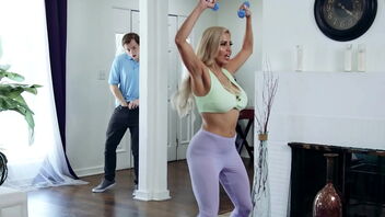 Stepson tempts stepmother while she is working out in taut leggings.